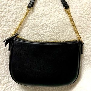 Small Black purse with a leather-gold handle